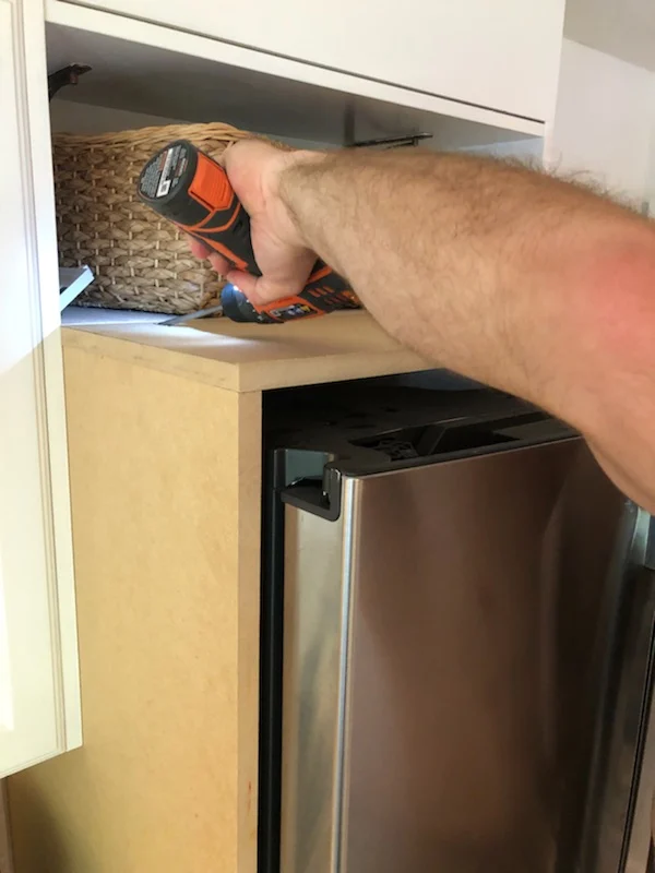 DIY refrigerator framing with cabinetry