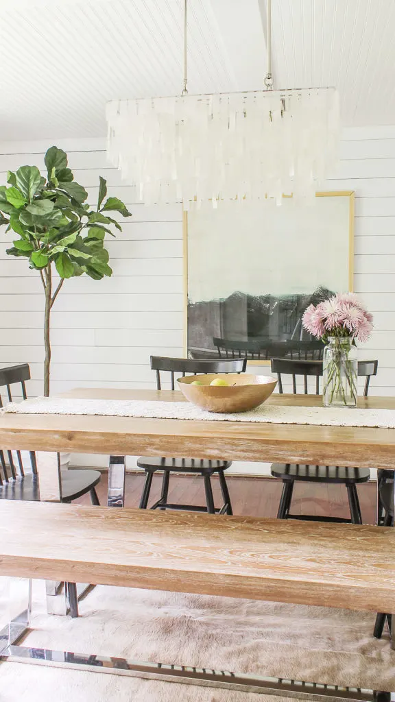 one of the best white paint colors for Modern Farmhouse dining rooms is Chantilly Lace by Benjamin Moore