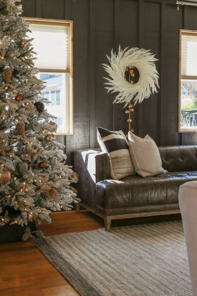 modern glam holiday decor with flocked tree