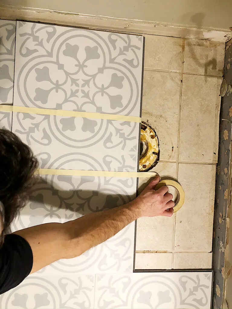 how to install luxury vinyl tiles on bathroom floors under a toilet