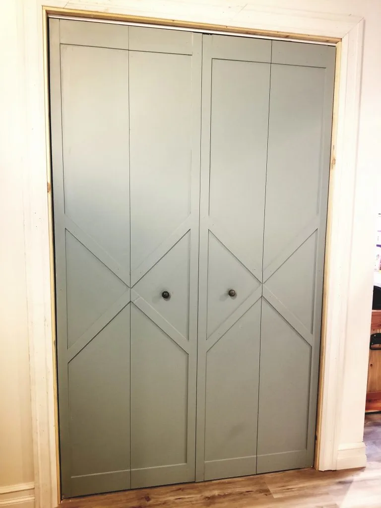 diy bi-fold closet door makeover with trim