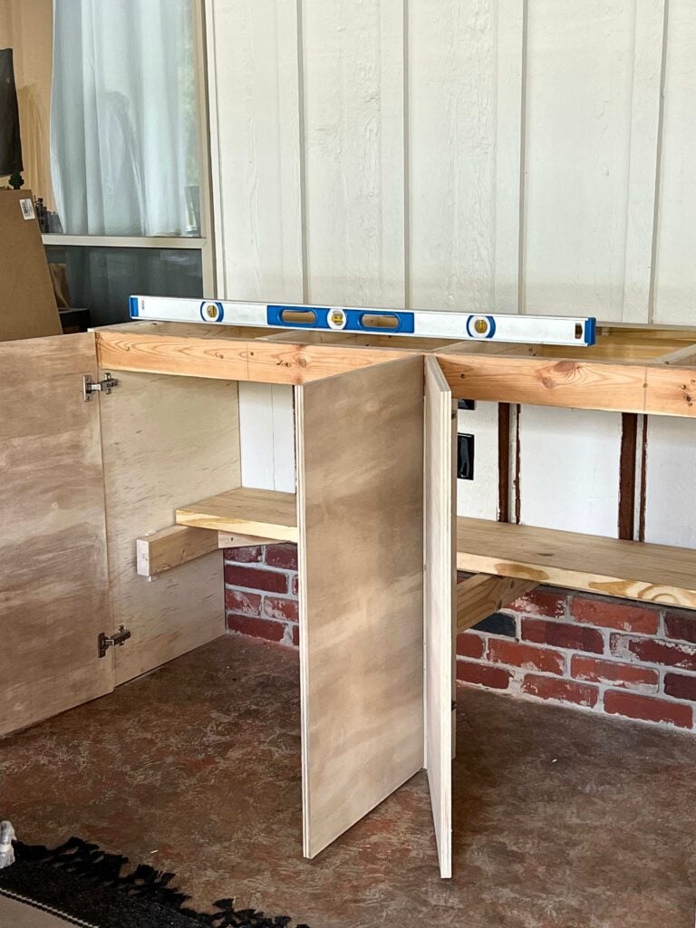 concealed hinges for the cabinet doors being attached to the cabinet frame