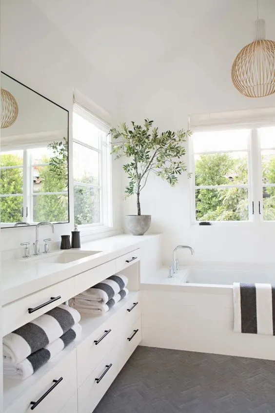 the most stylish ways to display and decorate with bathroom towels