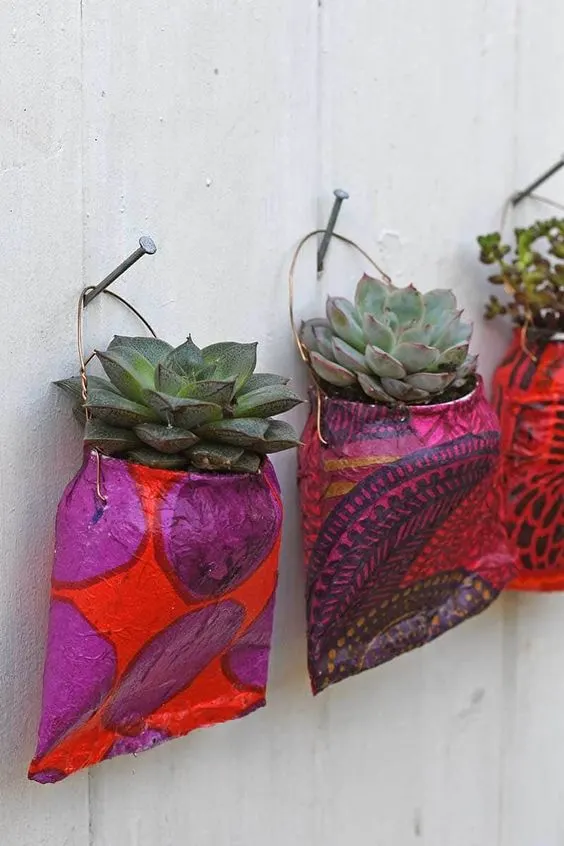 diy hanging succulent planters made from tin cans and painted