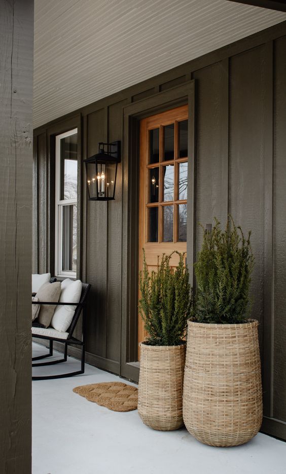front porch of a house with dark and modern exterior
