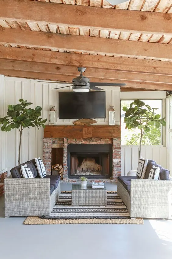 screened in porch decorated with contemporary decor and furniture