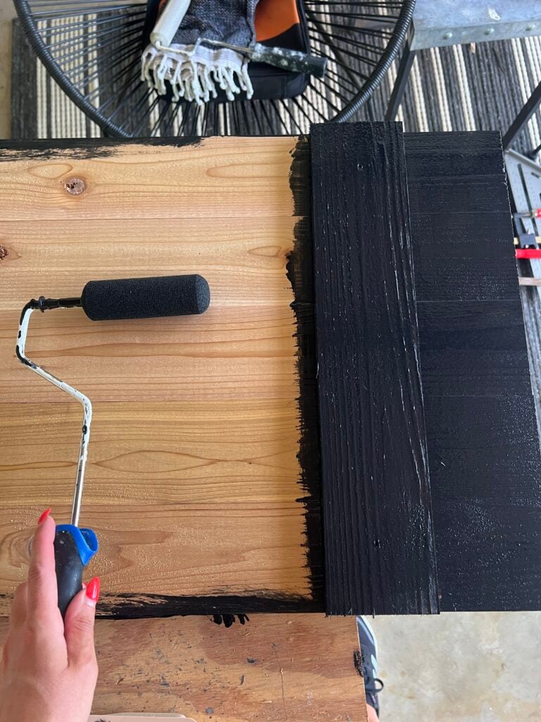 painting the diy cedar shutters black