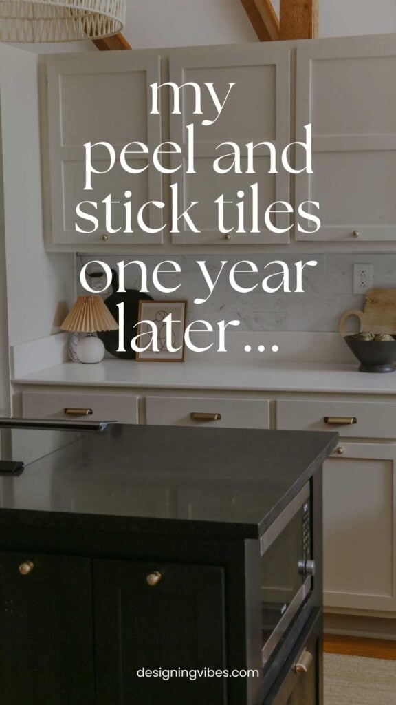 kitchen with natural cream cabinets and marble peel and stick tile backsplash one year later