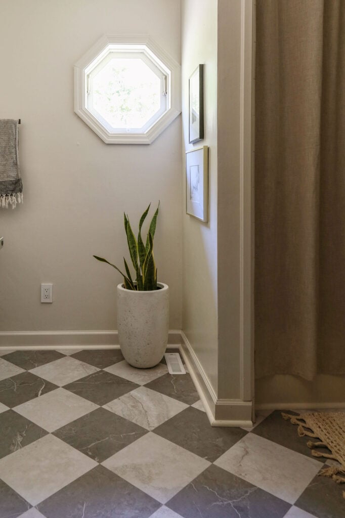 peel and stick vinyl flooring installed in a bathroom after one year of use