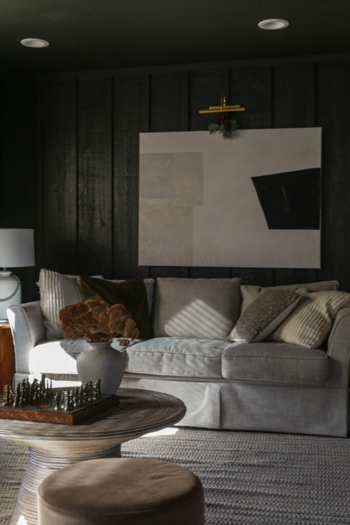 moody modern living room with minimal christmas decor 