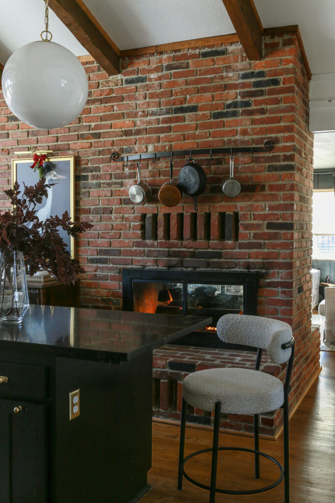 euro moody modern kitchen decorated for christmas with red ribbon and burgundy centerpiece