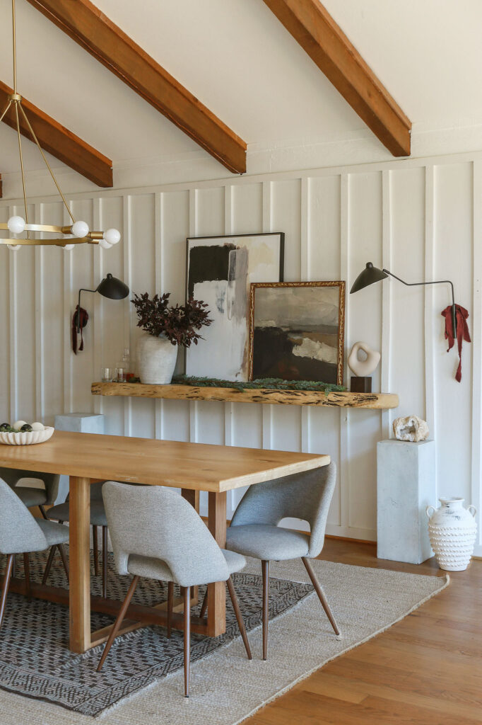 neutral minimal dining room with burgundy christmas decor 