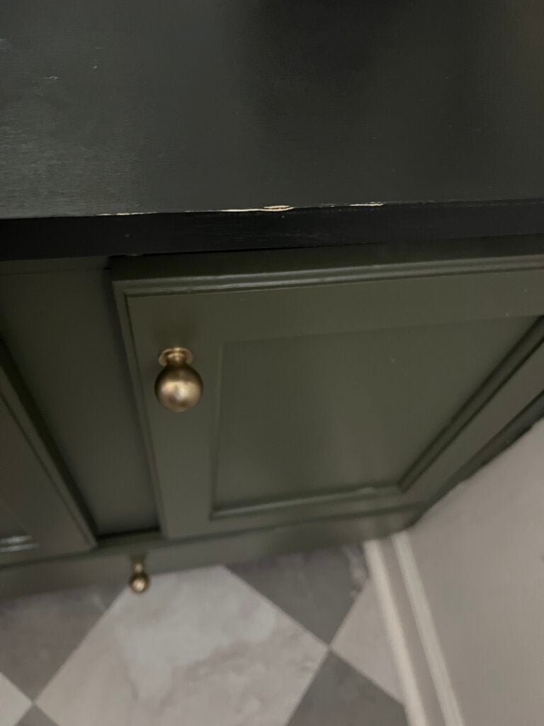 damage shown on my diy black countertops after over two years of use