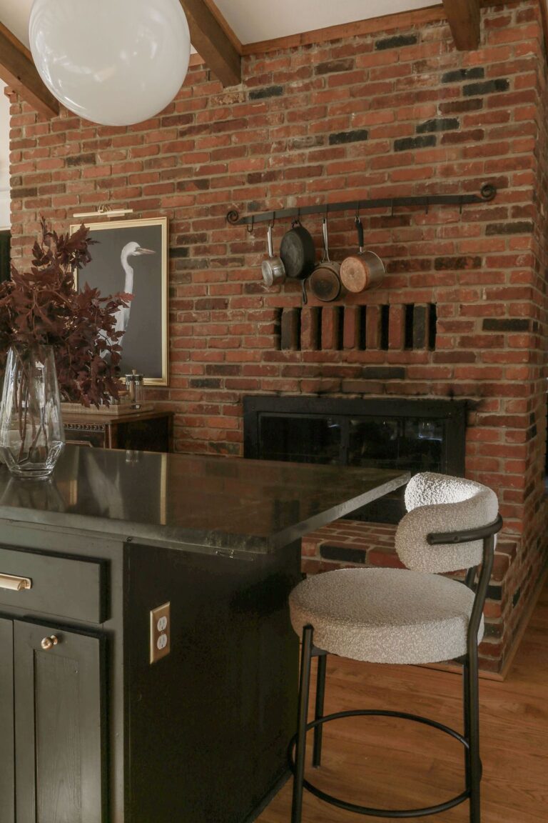 moody kitchen with cabinets painted in sherwin williams emerald urethane in color Tricorn Black