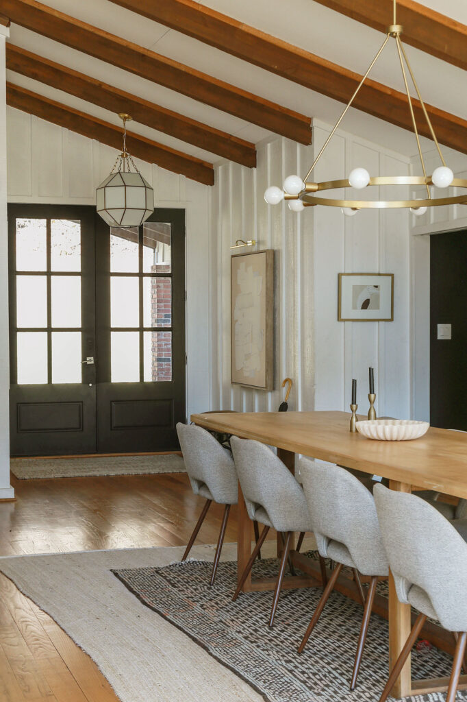 modern organic foyer with white walls and interior front door painted in Tricorn Black
