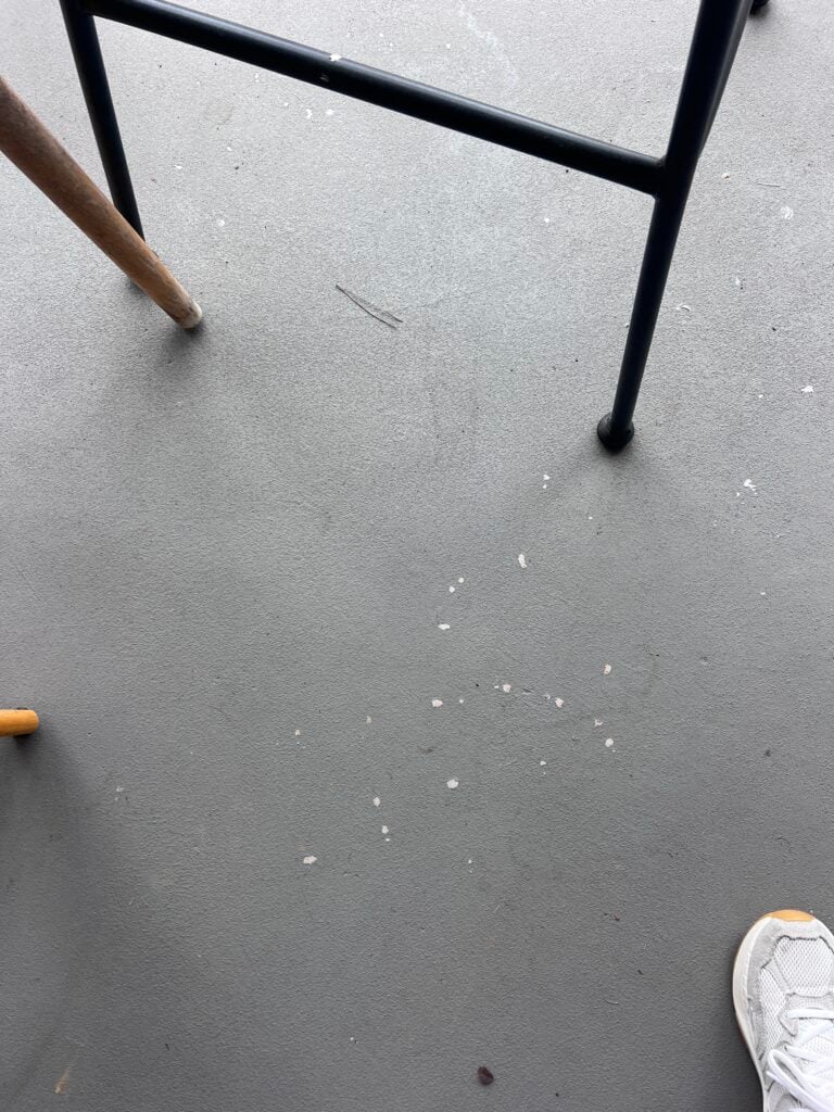 concrete paint on porch floors peeling in some areas with heavy use