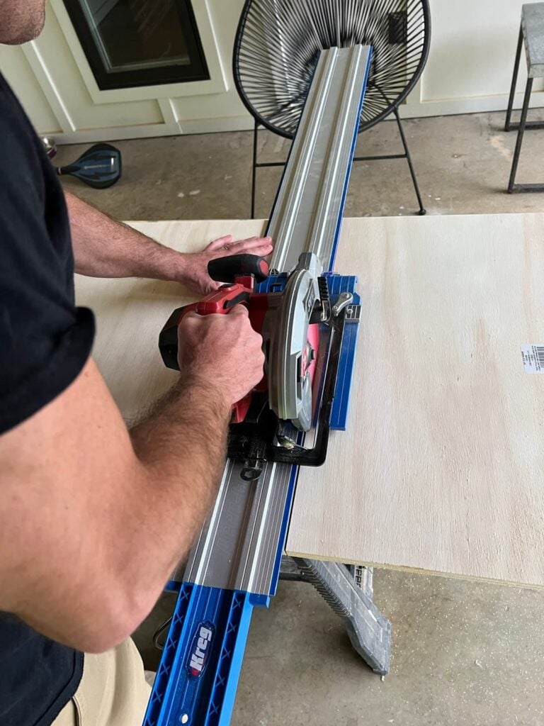 cutting plywood to make diy drawer frame 