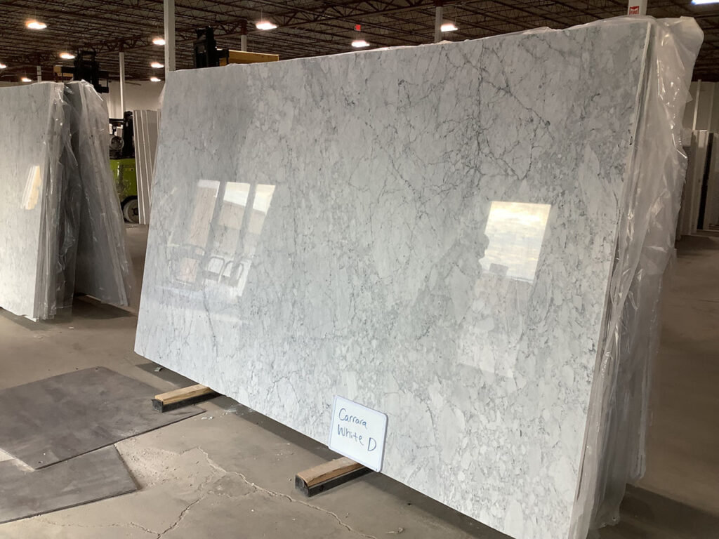 white carrara marble slab in stone yard