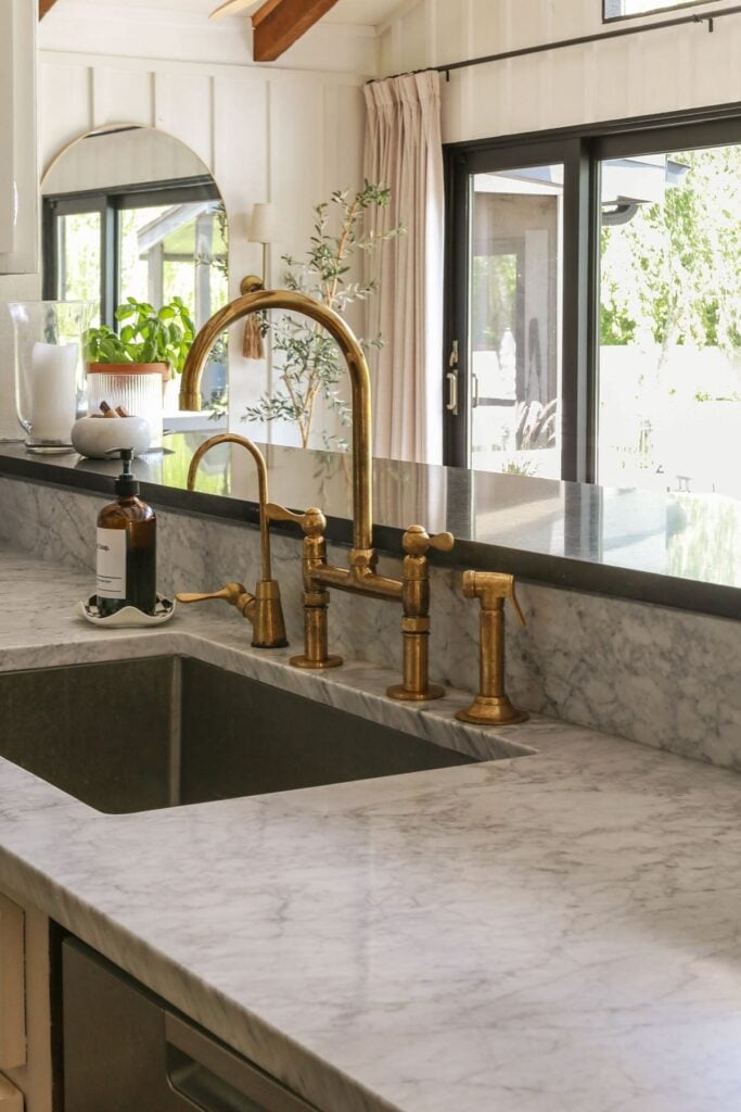 Unlacquered Brass Faucet after one year of use in kitchen - showing patina 