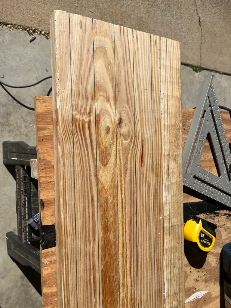 marking lines for fluted detail on the waterfall countertops 