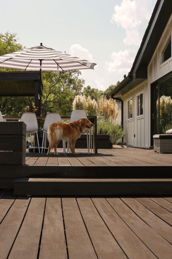 dark wood deck with shoji white home exterior