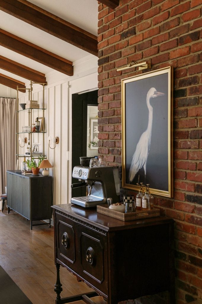 small coffee bar in kitchen on antique sideboard with vintage art